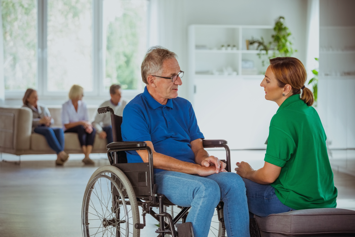 Family member supporting NDIS participant at home in Brisbane
