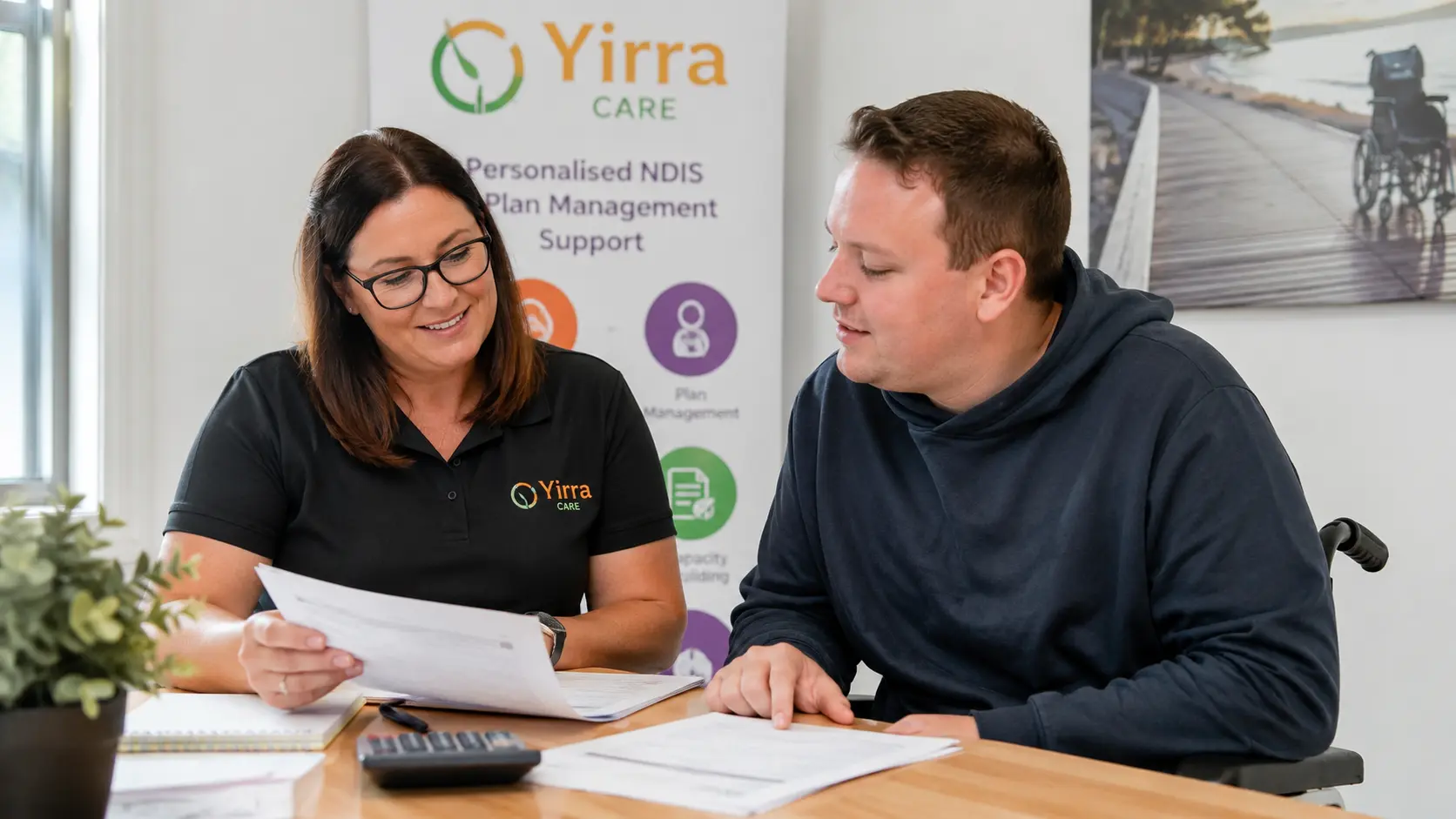 NDIS participant reviewing invoices with a plan manager for ndis plan manager support